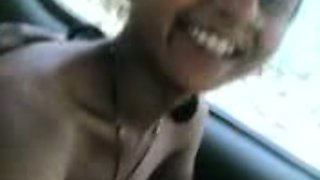 Whorish Indian girlfriend gives tug job in a car