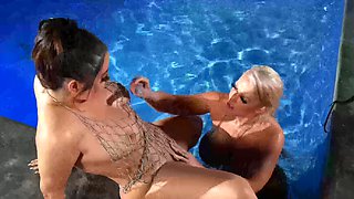 Alura Jenson and Alix Lovell playing in the pool