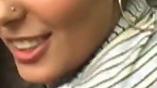 Hot brunette sucks a truck driver's cock in a parking lot making him cum
