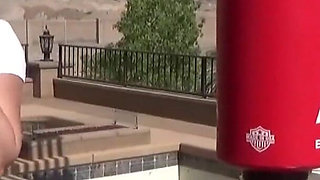 Smoking outdoor with the boxing muscled lady