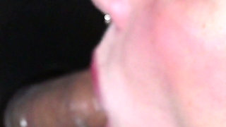 Girlfriend Sucks Condom off Stranger at Glory Hole