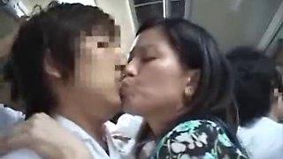 Mature Japanese MILF is groped and fucked in a bus