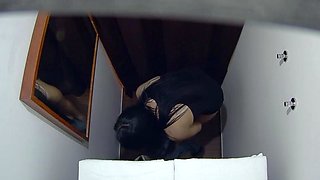 Longhaired brunette fingered during a massage