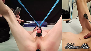 I hang him by his testicles, spanking his ass and cock.
