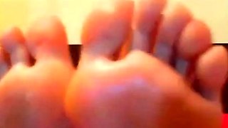 Blonde Licks Her Feet on Webcam