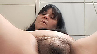 Stepmother in the Bathroom Silently Reaching Orgasm