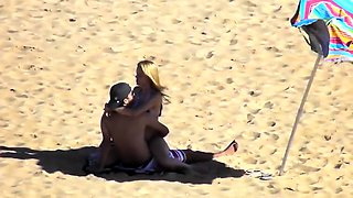 Voyeur finds a horny amateur couple having sex on the beach