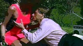 Amazing busty brunette slut doing blowjob outdoor