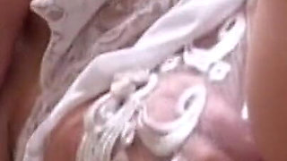 Sexy mature masturbating with her fingers in close up
