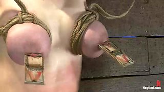 19yr Old With Huge Natural Tits Is Suspended To A Wall Her Breasts Are Tied To Hold Up Her Legs. - Kink