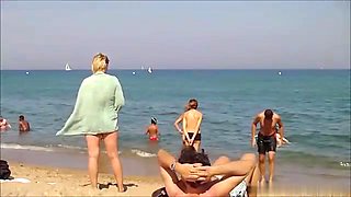 Woman Nude on Public Beach