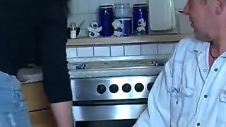 Married couple in the kitchen table