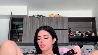 Busty babe playing with her big boobs