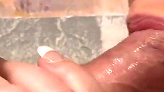 Wife gives husband a good handjob and sucks it deep