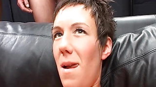 Short-haired German whore eats cum after DP gangbang action