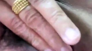 Thai granny 67 years old fingering her pussy