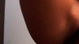 Oiled ebony babe masturbates with her fingers and toy in a close up video
