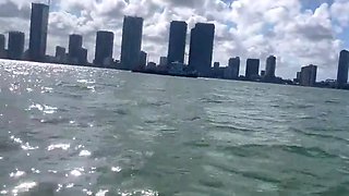 Busty Latina Bombshell Teases Outdoors on a Jetski