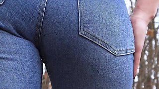 MILF in Blue Jeans Teases Her Amazing Ass Outdoors