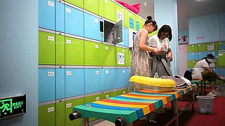 Cute amateur asian web cam girl playing with her toy