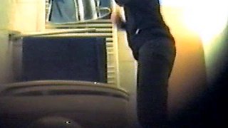 Girl using the toilet and filmed by voyeur 1