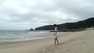 Randy brunette sucks guy&#039;s pole on the beach