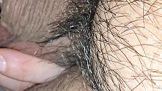 Step mom grabs and squeeze step son balls in bed