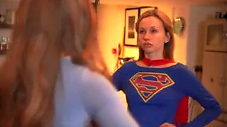 Superheroines Supergirl and Power Do Battle with Each Other
