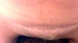 On top of him playing with his cock