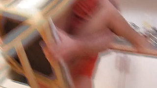 Tanned German doll facialized after a hot fuck in the kitchen