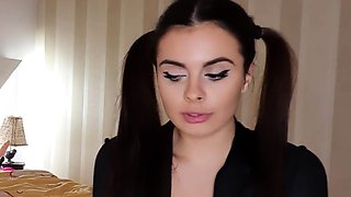 Busty babe playing with her big boobs
