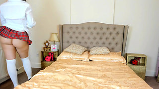 Sexy Student in Mini Skirt, Heels and Knee-high Socks Fucks Herself on Live Cam