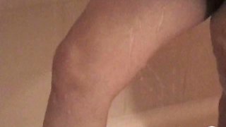 Pregnant nerd ex-girlfriend showering her swollen boobs