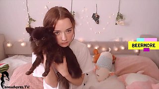 Petite plays on bed