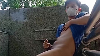 Fit young Asian hunk outdoor cemetery wank with splashing cumshot