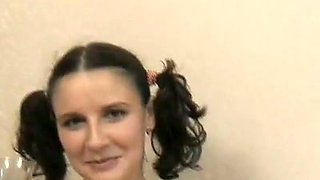 Cute brunette young bitch Karina takes off her clothes