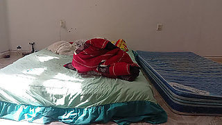 Mexican mother-in-law cleaning guest room in thong
