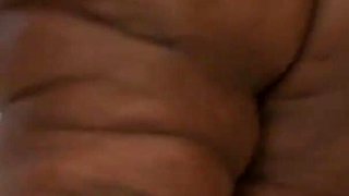 A very fat black woman with a huge ass and giant tits fucks a black cock