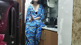 Indian stepmom watches and enters her stepson's Kitchen to fuck him.