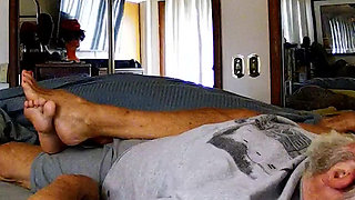 Auntie Ann Plays with Pussy While Giving Footjob