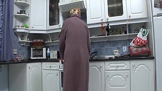 Milf pussy fucking in dogging position in the kitchen