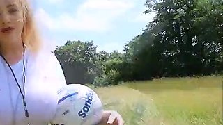 Blonde is flashing her big boobs in the outdoors