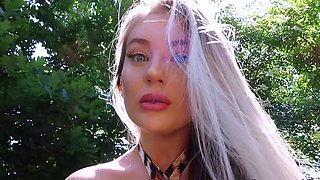 Blonde is flashing her big boobs in the outdoors