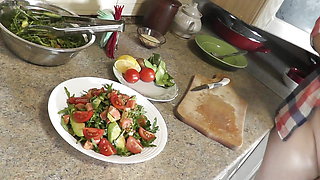 Milf sexy Platinum continues naked cooking in kitchen preparing salad for Christmas without panties  high heels. Naked in public