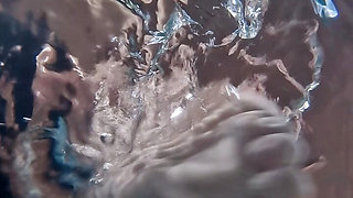 Cooling off - Teen strips naked in the pool, underwater camera