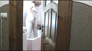 Naked woman sexy blonde in bathroom. Man roommate in short T shirt this watches, masturbate cock and cum. Cumshot. Old and young