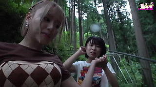 A Blonde and a Dark-haired Beauty Share Wild Passion Beneath the Open Sky -b