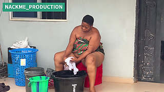 African Mama Multitasks on a Sunday Morning