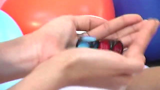 Two adorable asians playing a game