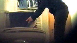 Girl using the toilet and filmed by voyeur 2